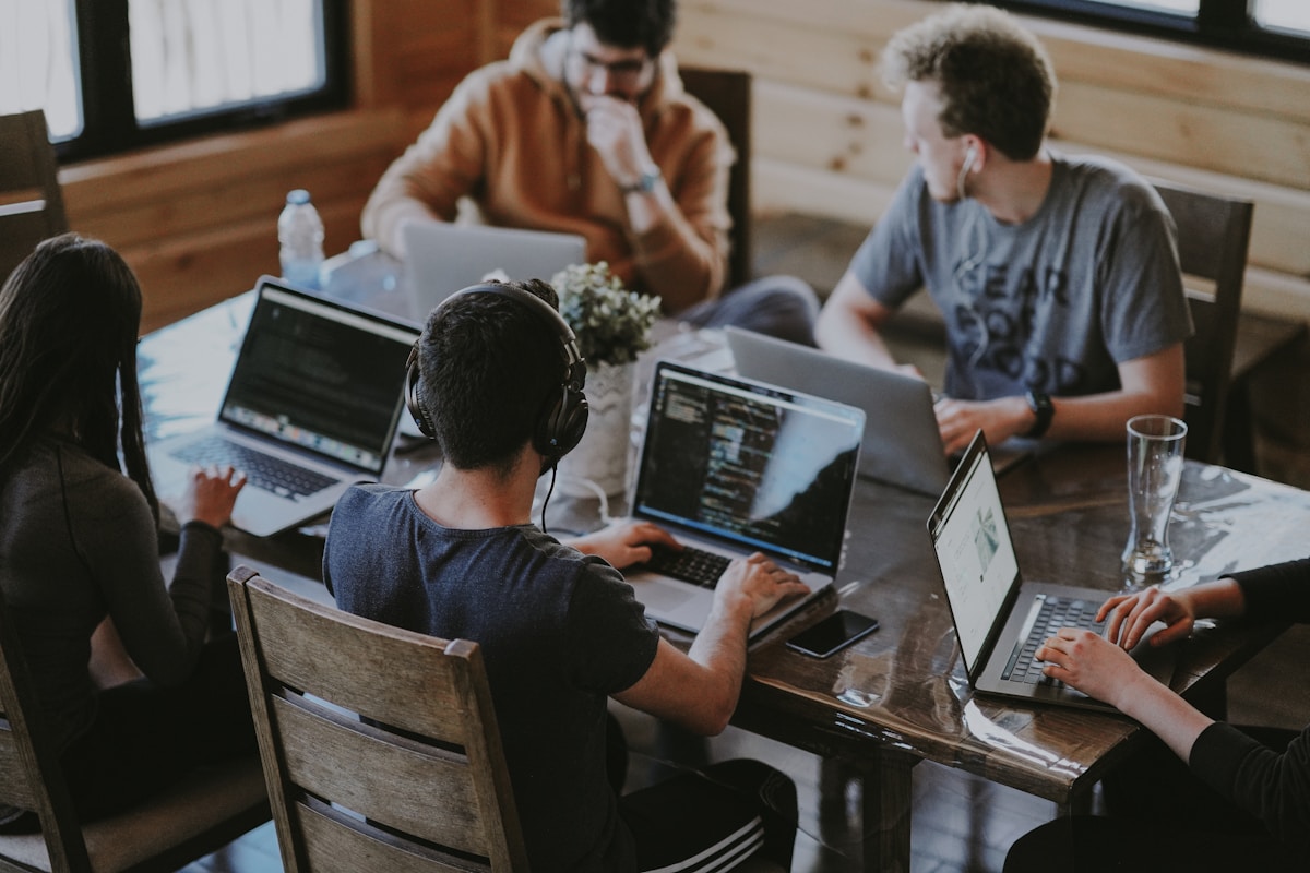SBL Nova team collaborating in a modern workspace